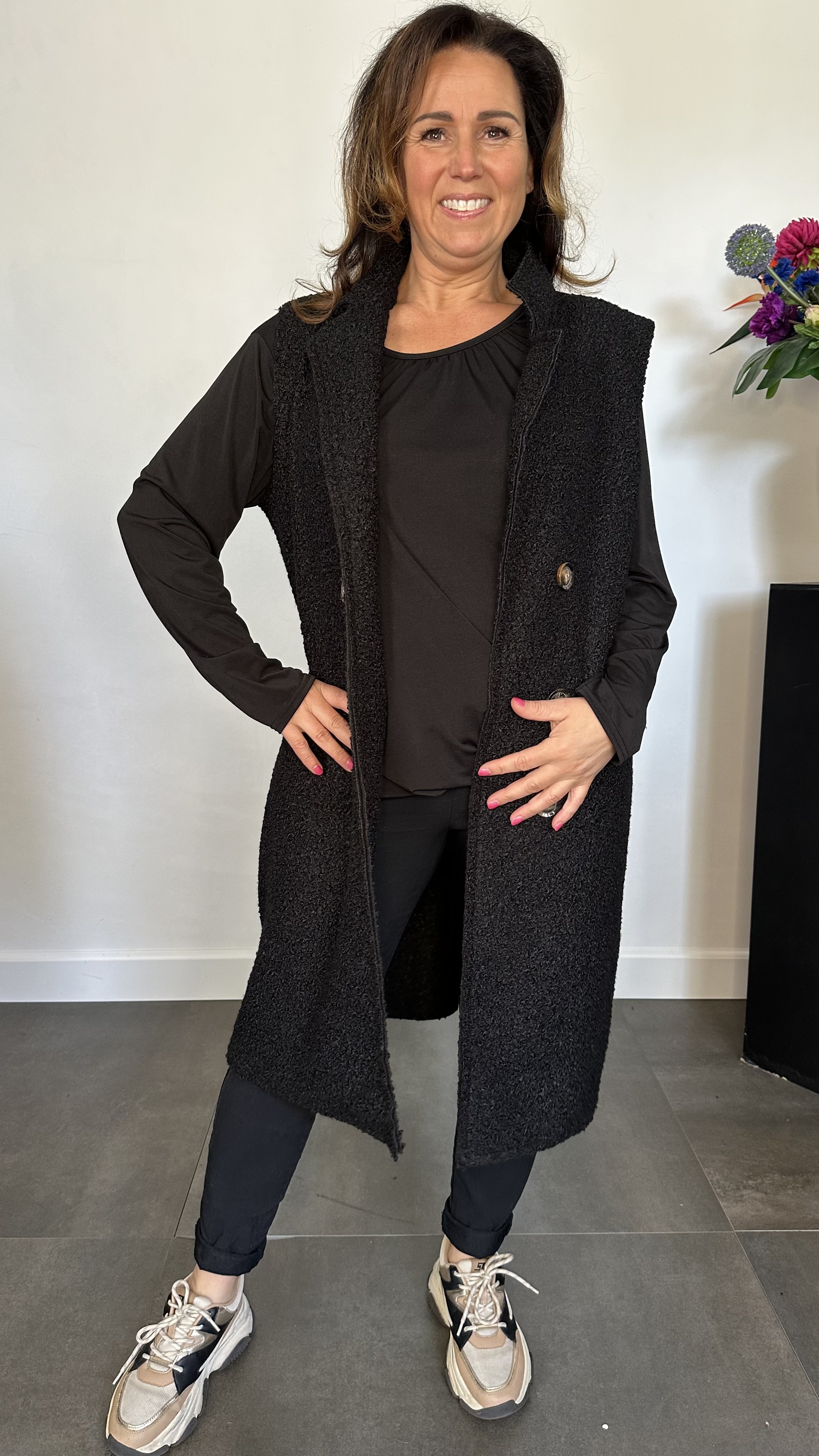 Lange teddy bodywarmer zwart