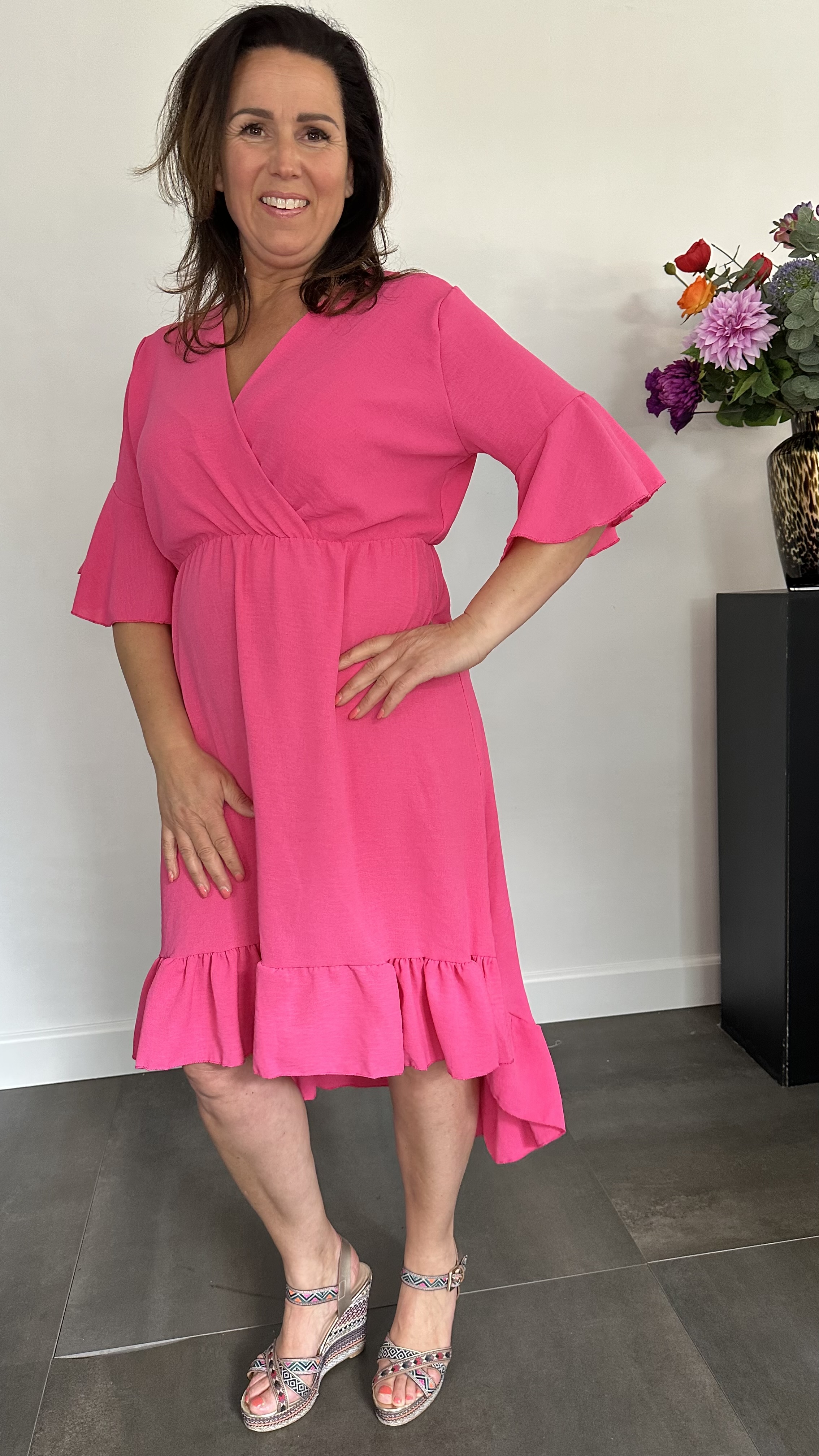 Jurk Aliya met ruche fuchsia