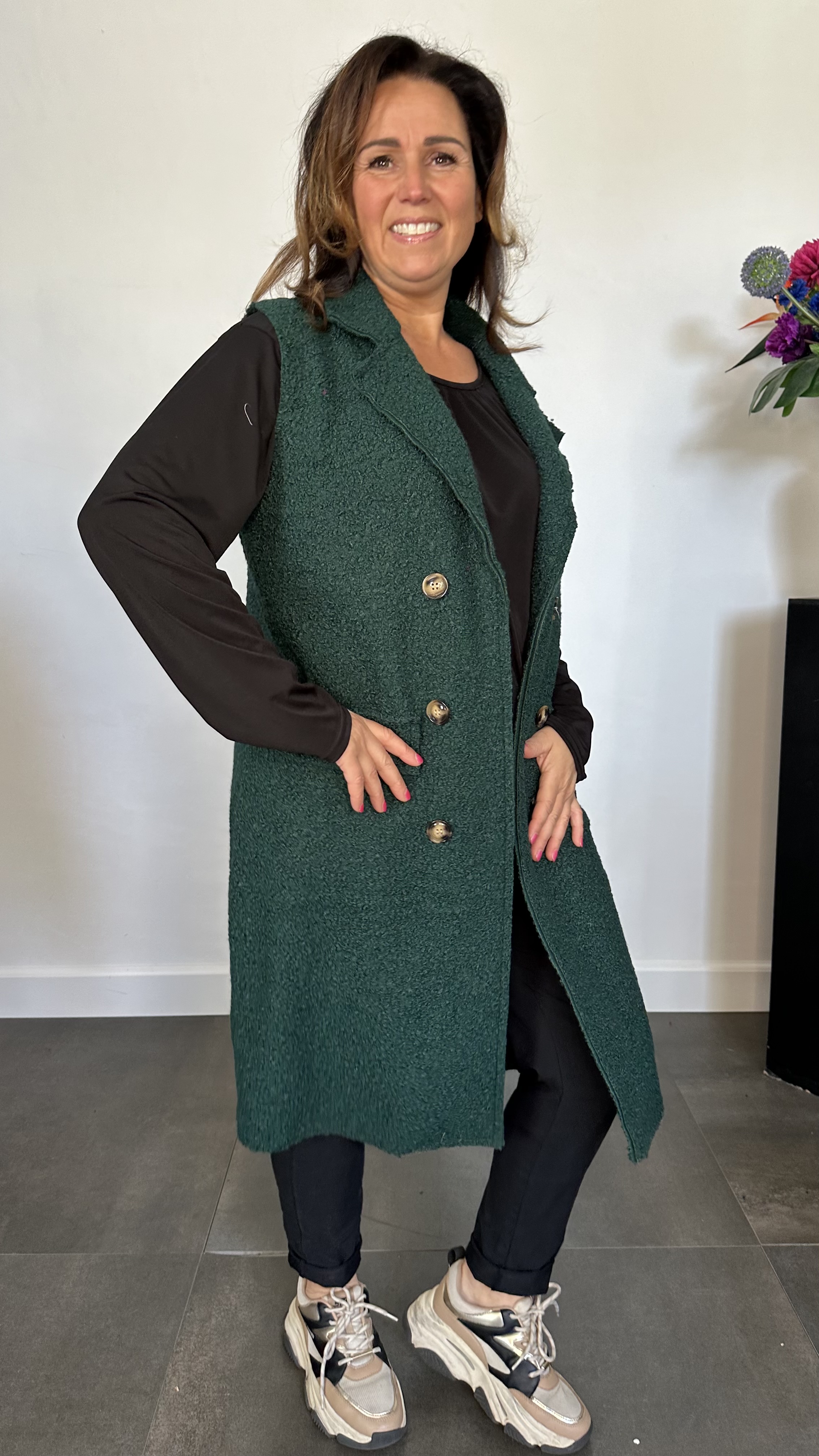 Lange teddy bodywarmer flessen groen