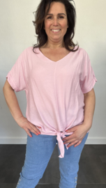 Top met gehaakt detail op de rug roze