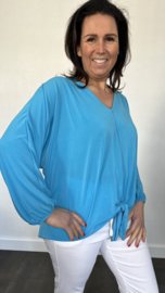 Top met strik travel turquoise blauw