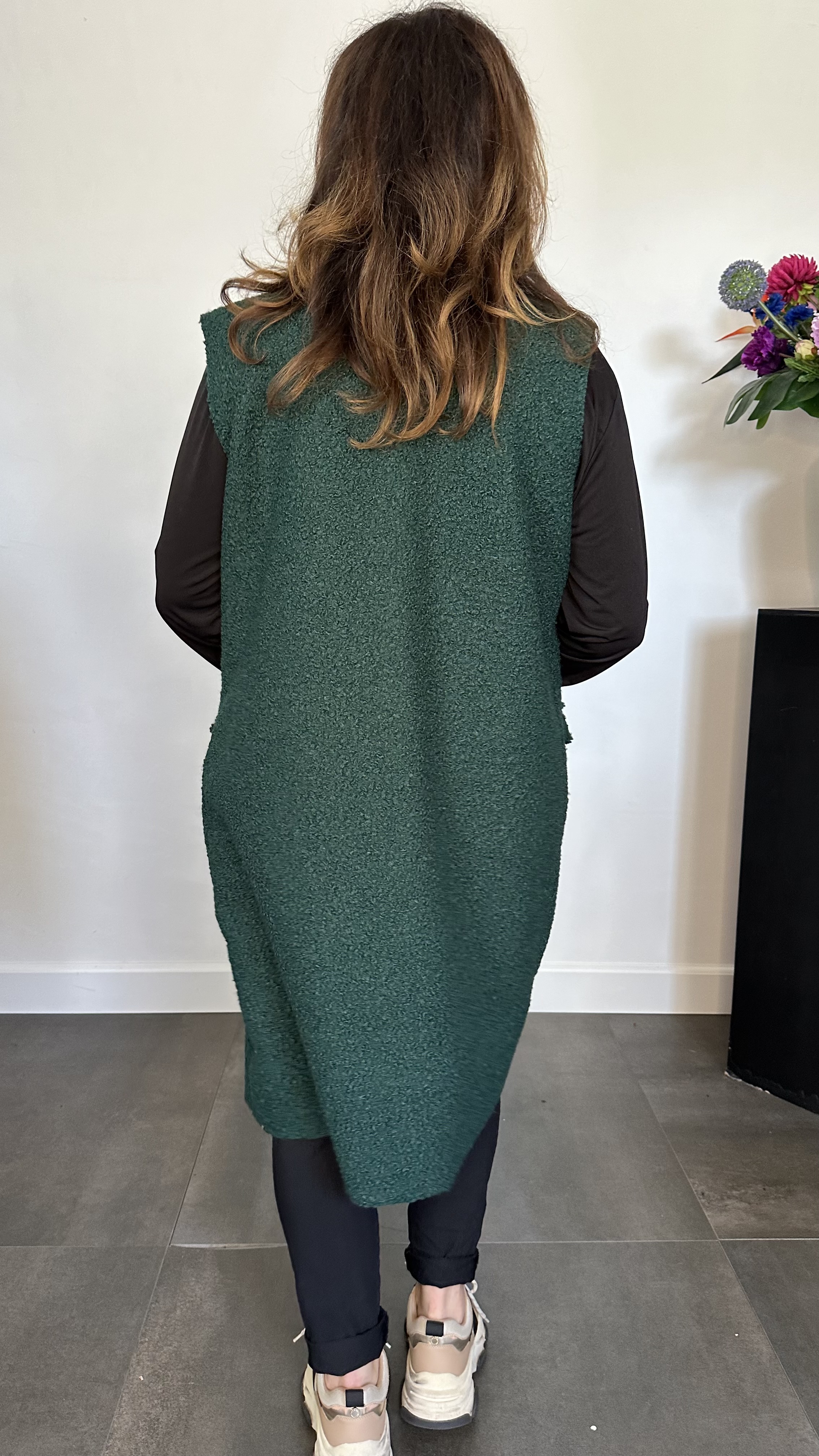 Lange teddy bodywarmer flessen groen