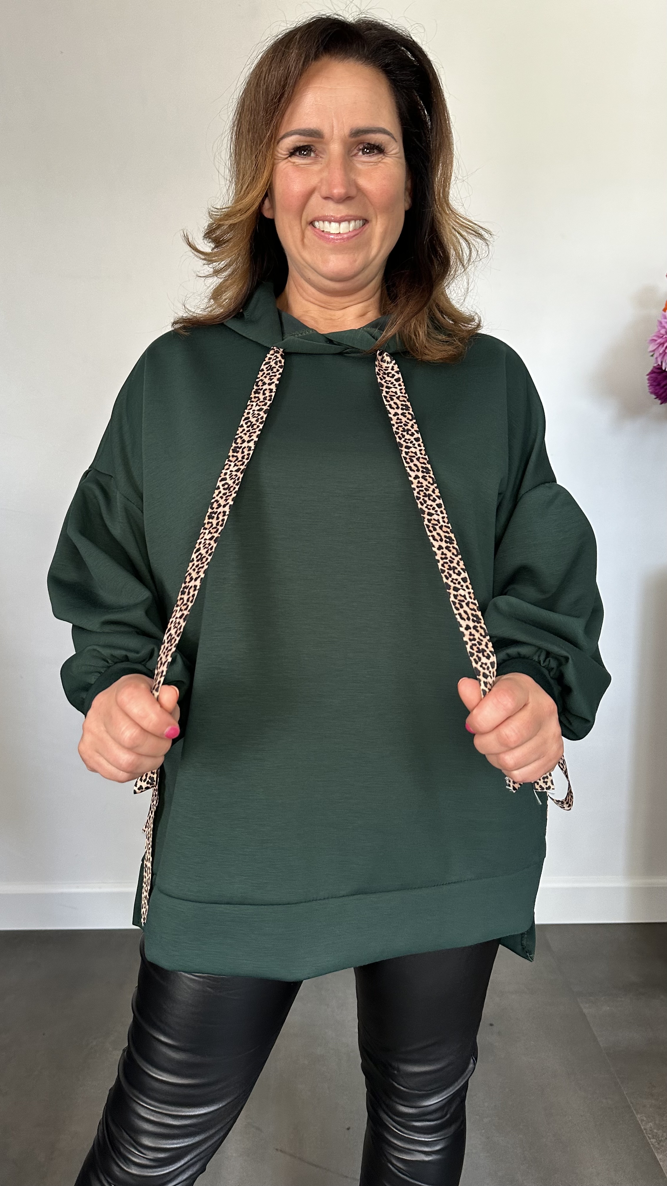 Sweater met capuchon en panter strikken flessen groen