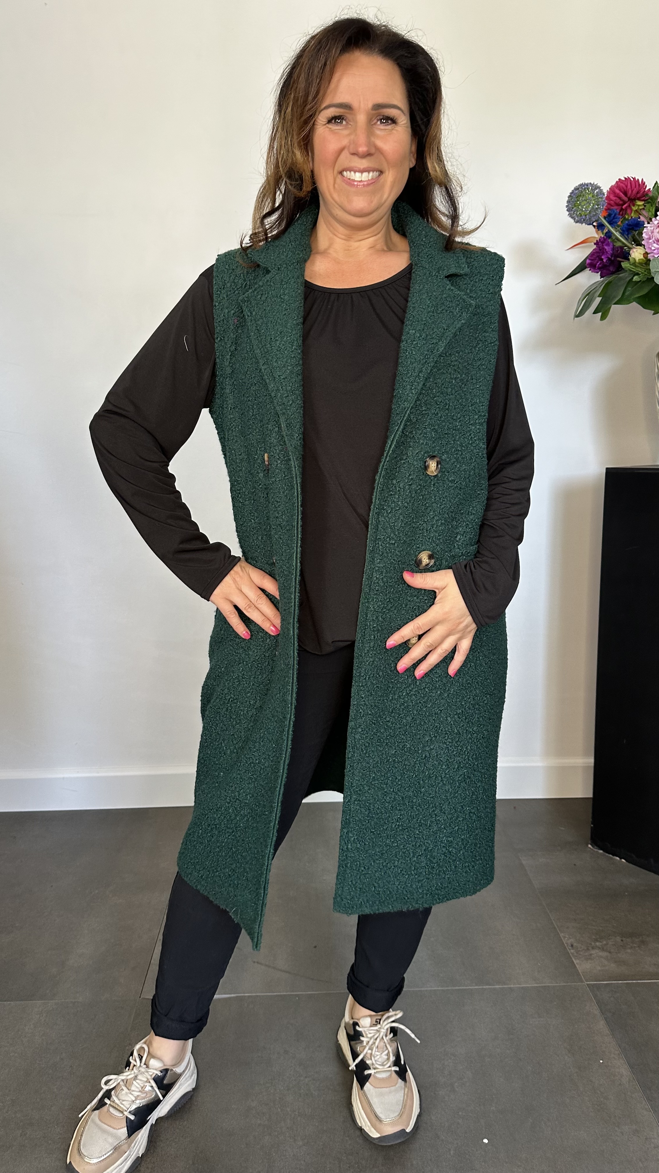 Lange teddy bodywarmer flessen groen