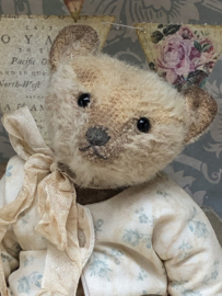 Hug Me Again Collectible bear "Henley" standing about 6 inch tall.