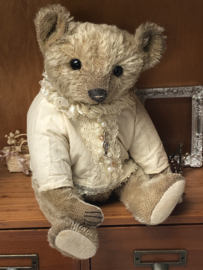 Hug Me Again Collectible bear "Xavier" standing about 11 inch tall.