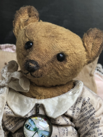 Hug Me Again Collectible bear "Theodore" standing about 6 inch tall.