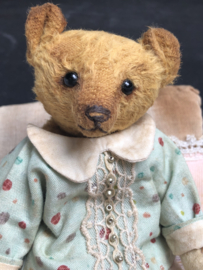 Hug Me Again Collectible bear "Pokkie" standing about 6 inch tall.