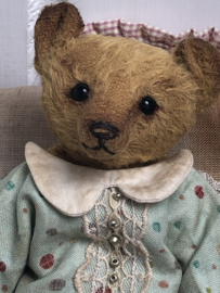 Hug Me Again Collectible bear "Pokkie" standing about 6 inch tall.