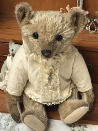 Hug Me Again Collectible bear "Xavier" standing about 11 inch tall.