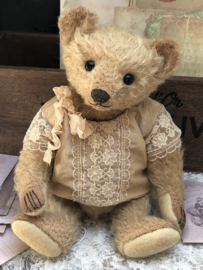 Hug Me Again Collectible bear "Sandy" standing about 9 inch tall.