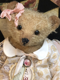 Hug Me Again Collectible bear "Lucette" standing about 10.5 inch tall.