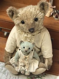 Hug Me Again Collectible bear "Xavier" standing about 11 inch tall.