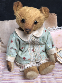 Hug Me Again Collectible bear "Pokkie" standing about 6 inch tall.