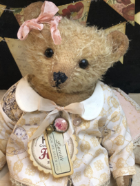 Hug Me Again Collectible bear "Lucette" standing about 10.5 inch tall.