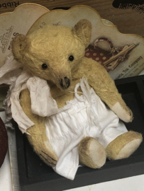 Hug Me Again Collectible bear "Finn" standing about 6 inch tall.