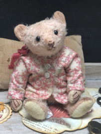 Hug Me Again Collectible bear "Tiny Bibby" standing about 6 inch tall.