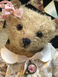 Hug Me Again Collectible bear "Lucette" standing about 10.5 inch tall.