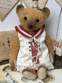 Hug Me Again Collectible bear "Little Marina" standing about 7.5 inch tall.
