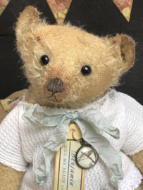 Hug Me Again Collectible bear "Benjamin" standing about 9 inch tall.