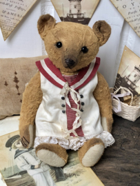 Hug Me Again Collectible bear "Little Marina" standing about 7.5 inch tall.