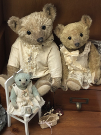 Hug Me Again Collectible bear "Calla" standing about 9 inch tall.