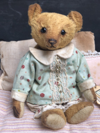 Hug Me Again Collectible bear "Pokkie" standing about 6 inch tall.