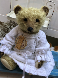 Hug Me Again Collectible bear "Olivia" standing about 12.5 inch tall.