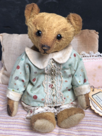 Hug Me Again Collectible bear "Pokkie" standing about 6 inch tall.