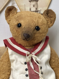 Hug Me Again Collectible bear "Little Marina" standing about 7.5 inch tall.