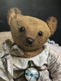 Hug Me Again Collectible bear "Theodore" standing about 6 inch tall.