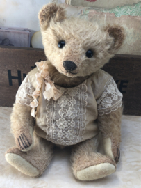 Hug Me Again Collectible bear "Sandy" standing about 9 inch tall.