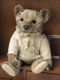 Hug Me Again Collectible bear "Xavier" standing about 11 inch tall.