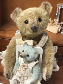 Hug Me Again Collectible bear "Calla" standing about 9 inch tall.