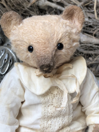 Hug Me Again Collectible bear "Lucy" standing about 6.5 inch tall.