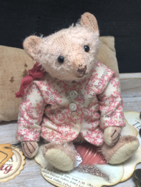Hug Me Again Collectible bear "Tiny Bibby" standing about 6 inch tall.