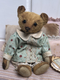 Hug Me Again Collectible bear "Pokkie" standing about 6 inch tall.