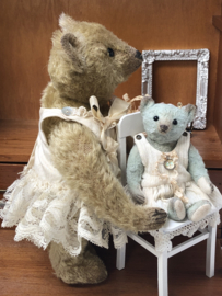 Hug Me Again Collectible bear "Calla" standing about 9 inch tall.