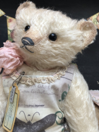 Hug Me Again Collectible bear "Rosalie" standing about 10.5 inch tall.