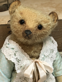 Hug Me Again Collectible bear "Channella" standing about 10" inch tall.