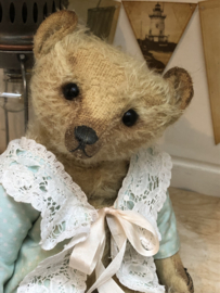Hug Me Again Collectible bear "Channella" standing about 10" inch tall.