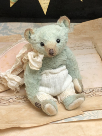 Hug Me Again Collectible bear "Quinn" standing about 6 inch tall.