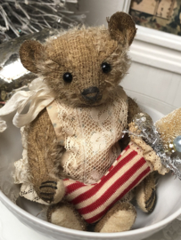 Hug Me Again Collectible bear "Little Teddy Twinkle" standing about 6 inch tall.