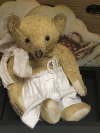 Hug Me Again Collectible bear "Finn" standing about 6 inch tall.