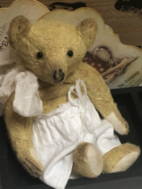 Hug Me Again Collectible bear "Finn" standing about 6 inch tall.