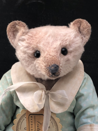 Hug Me Again Collectible bear "Pretty Patty" standing about 9" inch tall.