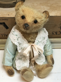 Hug Me Again Collectible bear "Channella" standing about 10" inch tall.