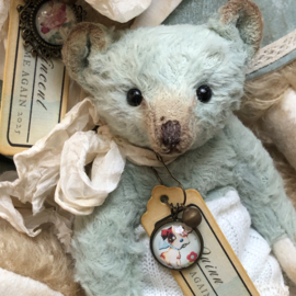 Hug Me Again Collectible bear "Quinn" standing about 6 inch tall.