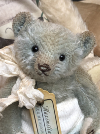 Hug Me Again Collectible bear "Maximilian" standing about 6 inch tall.