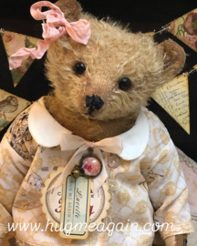 Hug Me Again Collectible bear "Lucette" standing about 10.5 inch tall.